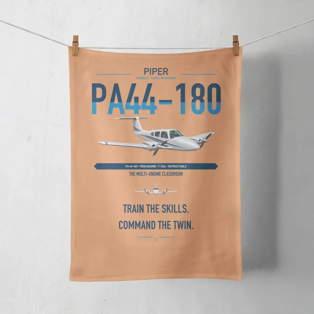 Piper PA-44-180 Seminole design on orange towel
