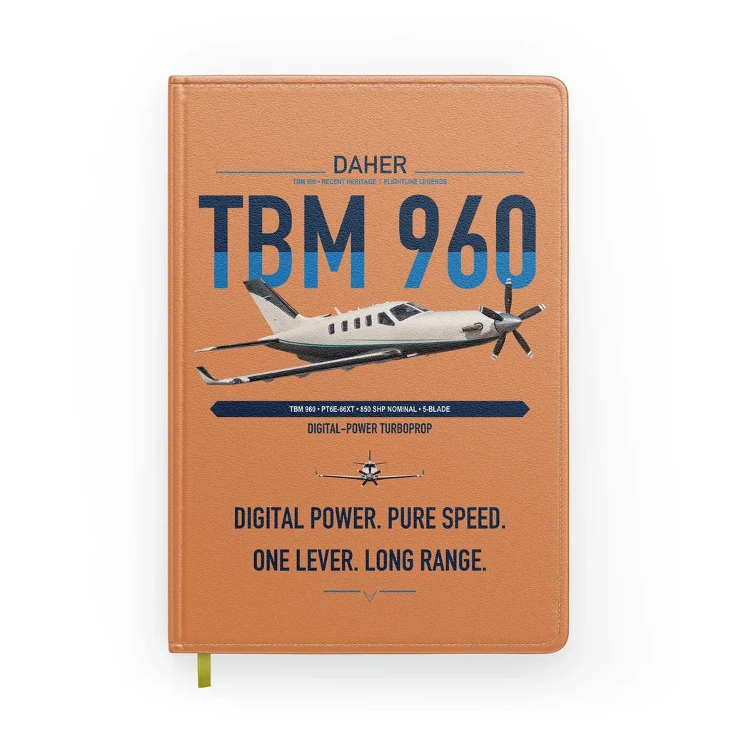 Daher TBM 960 design on orange notebook