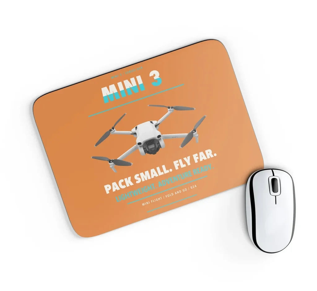 DJI Mini 3 design on orange rectangle mouse pad