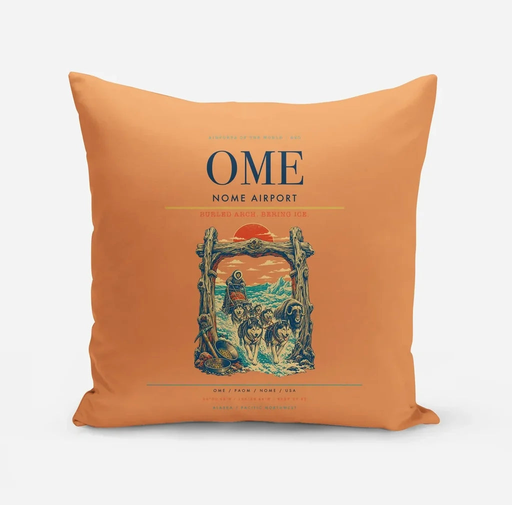Nome Airport (OME) design on orange pillow