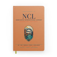 Thumbnail for Newcastle International Airport (NCL) design on orange notebook