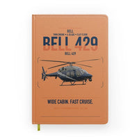 Thumbnail for Bell 429 design on orange notebook