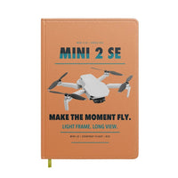 Thumbnail for DJI Mini 2 SE design on orange notebook