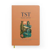 Thumbnail for Trang Airport (TST) design on orange notebook