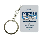 Thumbnail for Cessna 150M design on light gray designed key chain, double-side print