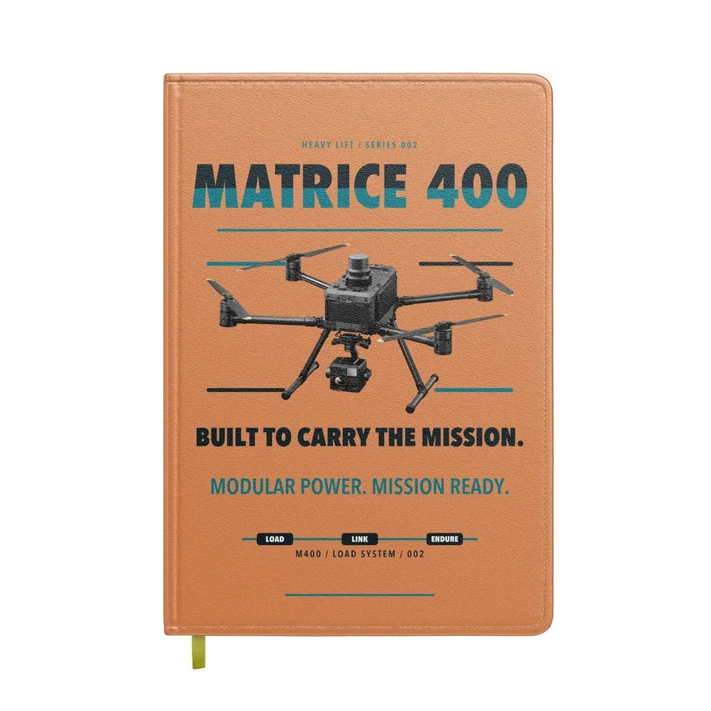 DJI Matrice 400 design on orange notebook