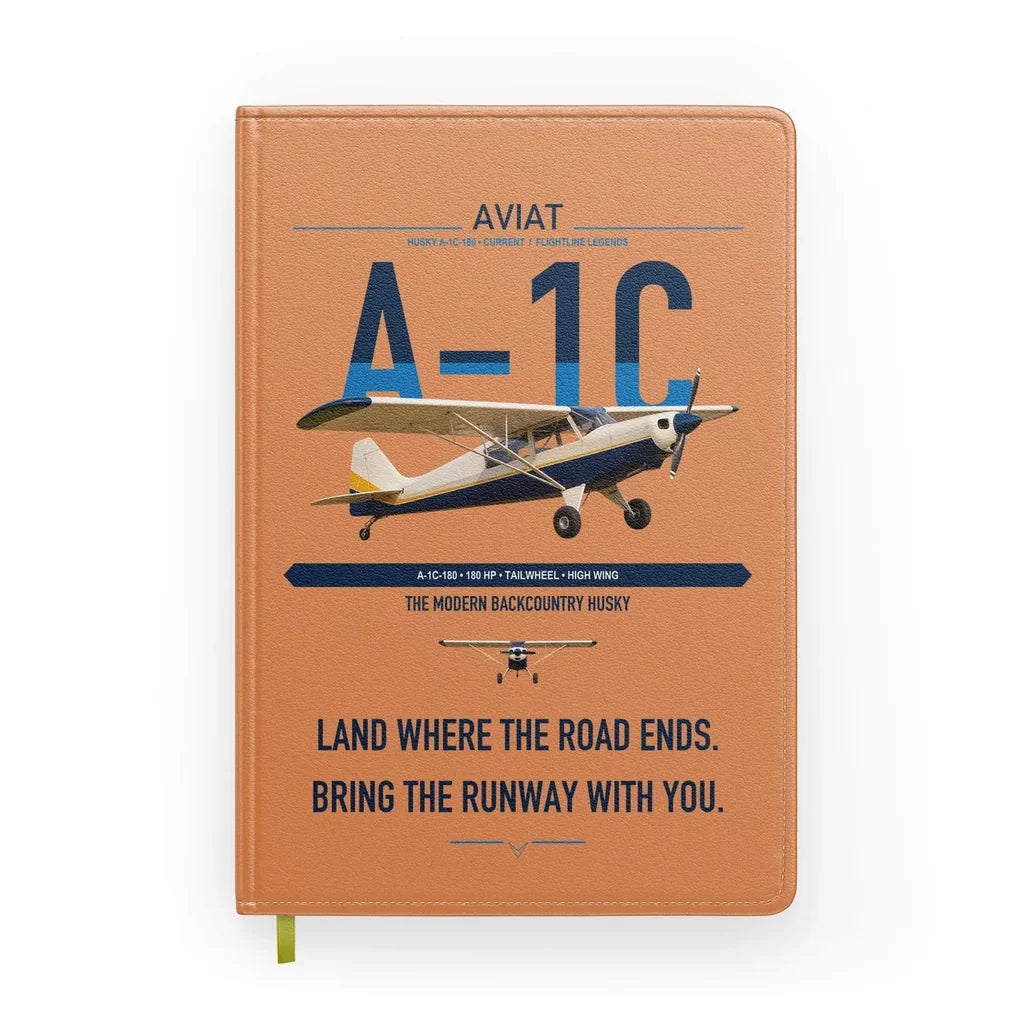 Aviat Husky A-1C-180 design on orange notebook