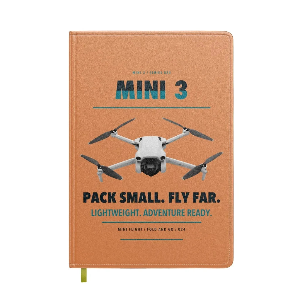 DJI Mini 3 design on orange notebook