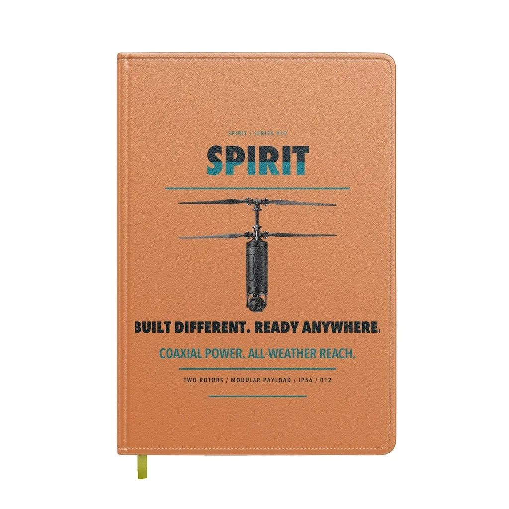 Ascent AeroSystems Spirit design on orange notebook