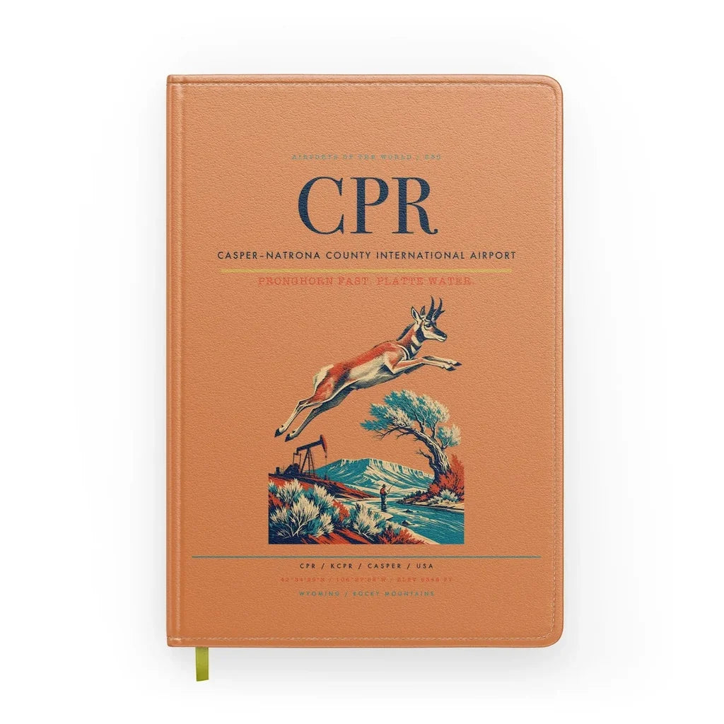 Casper–Natrona County International Airport (CPR) design on orange notebook