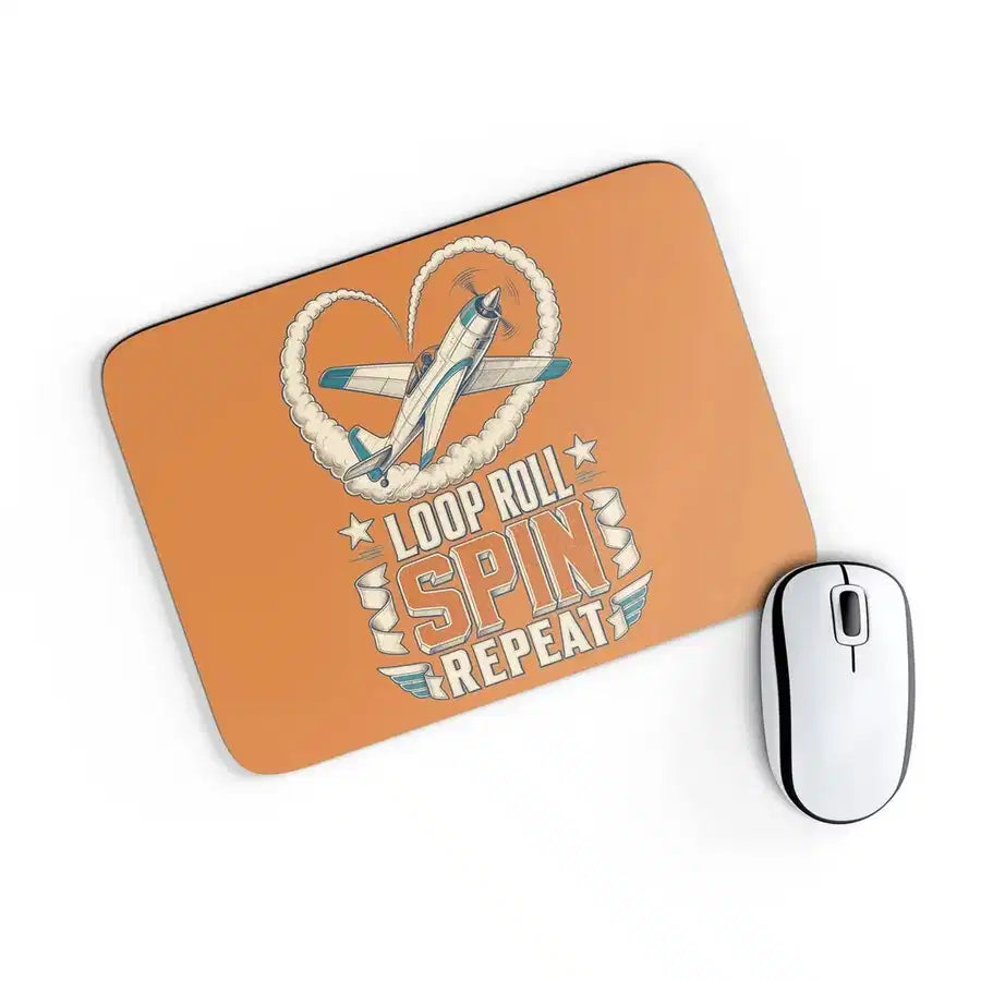 Loop Roll Spin Repeat design on orange rectangle mouse pad