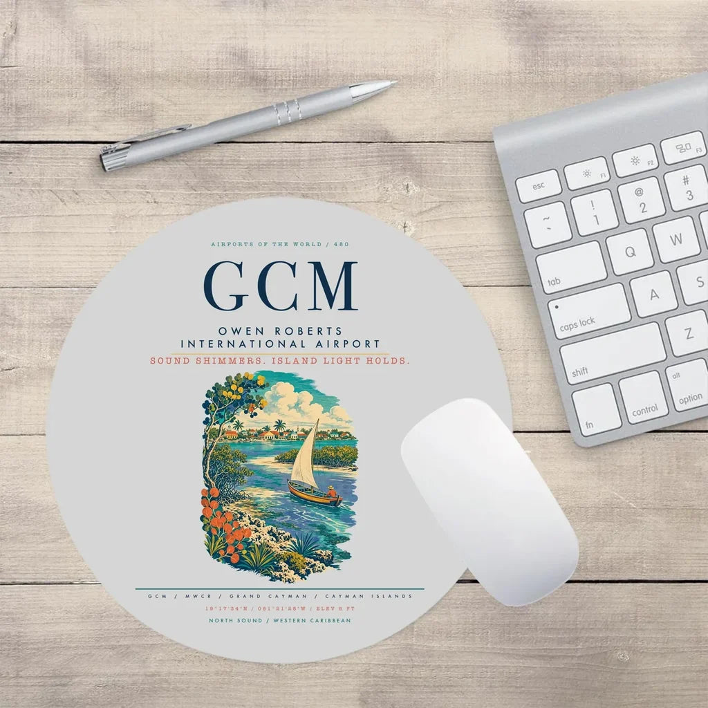 Owen Roberts International Airport (GCM) design on light gray round mouse pad