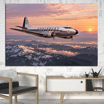 Northwest Airlines Martin 2-0-2 crossing the Cascade Range in rose-colored dawn light canvas - 1 Piece