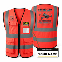 Thumbnail for Skydio X10 aviation design on red high-visibility reflective vest with custom name badge