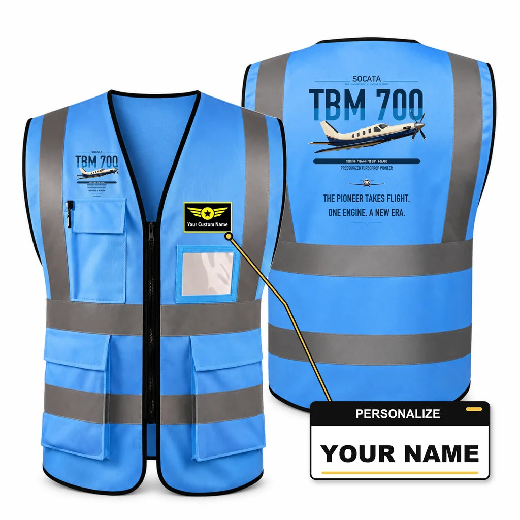 Socata TBM 700 aviation design on blue high-visibility reflective vest with custom name badge