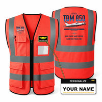 Thumbnail for Socata TBM 850 aviation design on red high-visibility reflective vest with custom name badge
