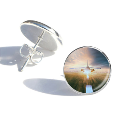 Side view of Airplane Flying Over Runway aviation stud earrings in stainless steel, polished finish.