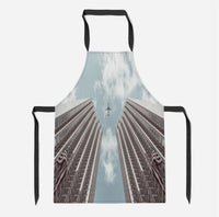 Thumbnail for Airplane Flying over Big Buildings Designed Kitchen Aprons