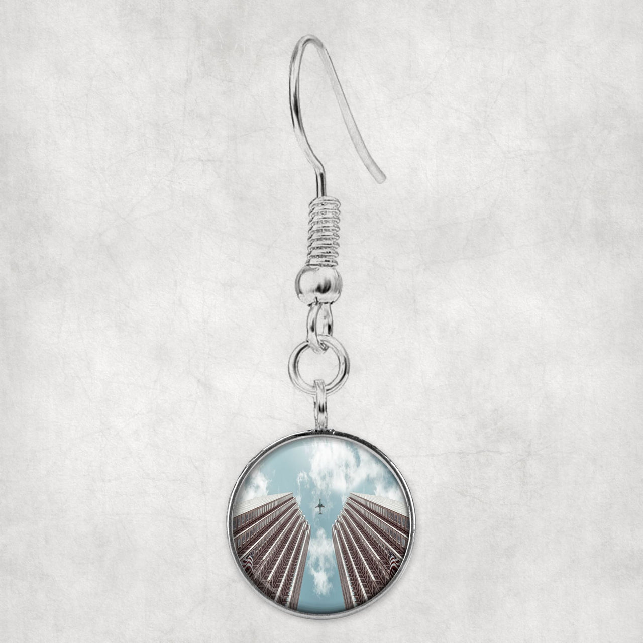 Airplane Flying over Big Buildings Designed Earrings