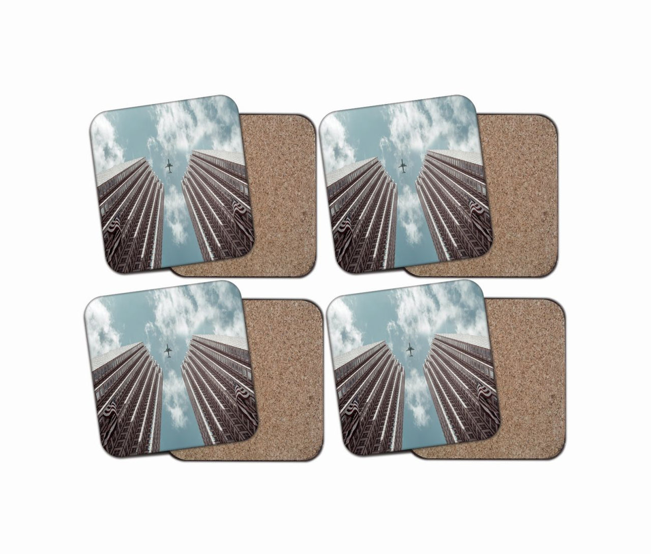 Airplane Flying over Big Buildings Designed Coasters