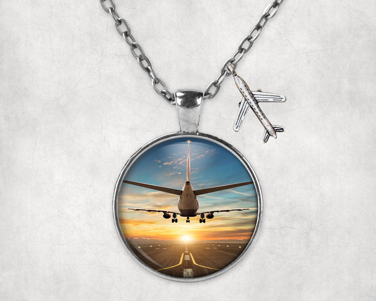 Airplane over Runway Towards the Sunrise Designed Necklaces