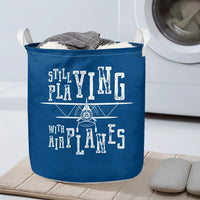 Thumbnail for Still Playing With Airplanes Designed Laundry Baskets