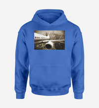 Thumbnail for Departing Aircraft & City Scene behind Designed Hoodies