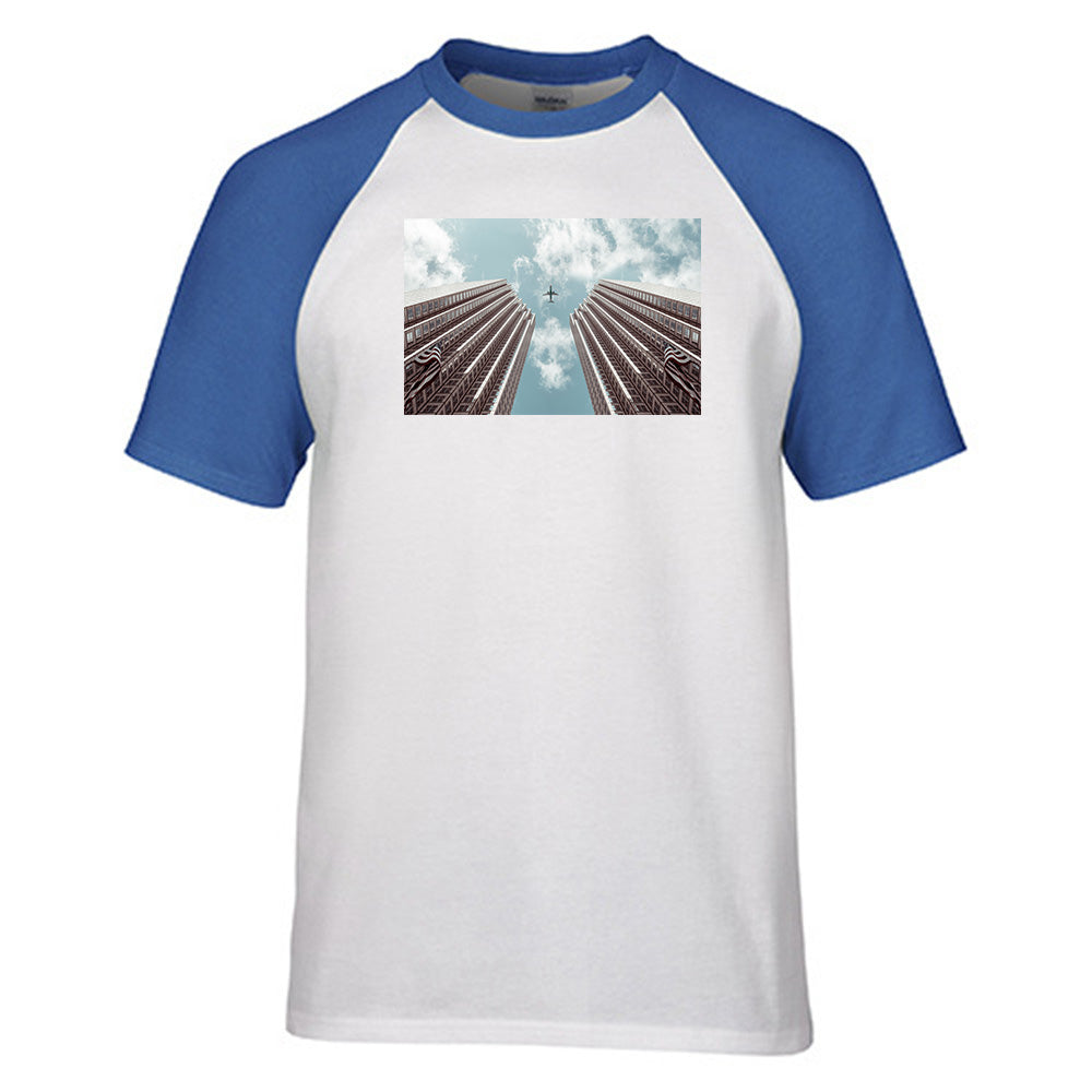 Airplane Flying over Big Buildings Designed Raglan T-Shirts