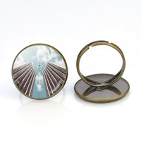 Thumbnail for Airplane Flying over Big Buildings Designed Rings