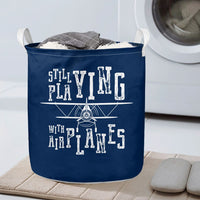 Thumbnail for Still Playing With Airplanes Designed Laundry Baskets