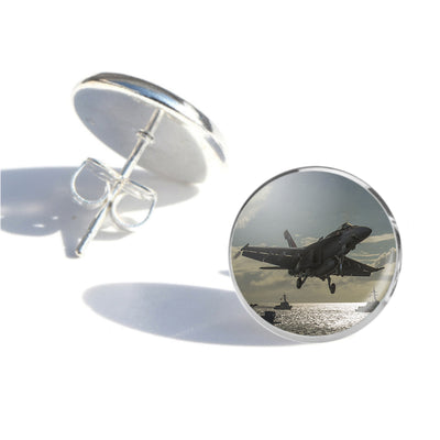 Deparing Jet from Sea Base aviation stud earrings, stainless steel body with engraved detail.