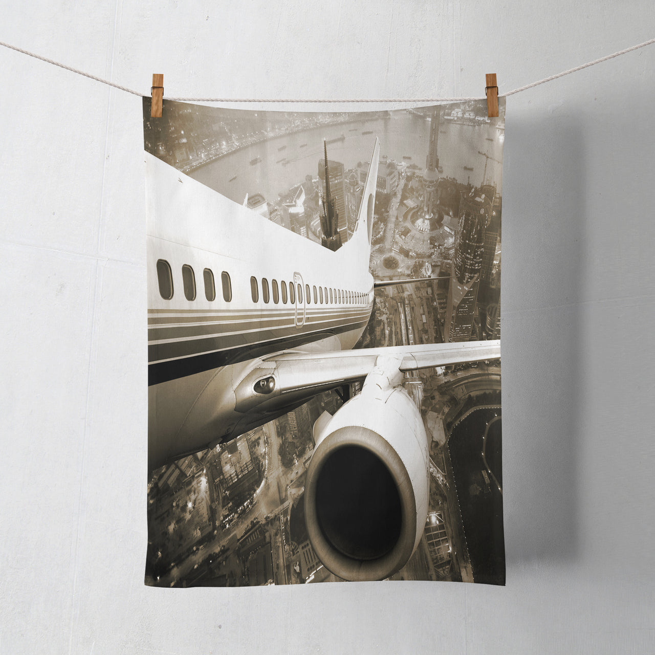 Departing Aircraft & City Scene behind Designed Towels