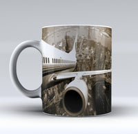 Thumbnail for Departing Aircraft & City Scene behind Designed Mugs