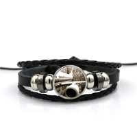 Thumbnail for Departing Aircraft & City Scene behind Designed Leather Bracelets