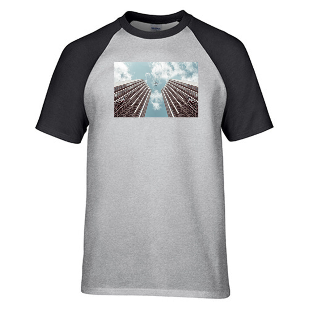 Airplane Flying over Big Buildings Designed Raglan T-Shirts