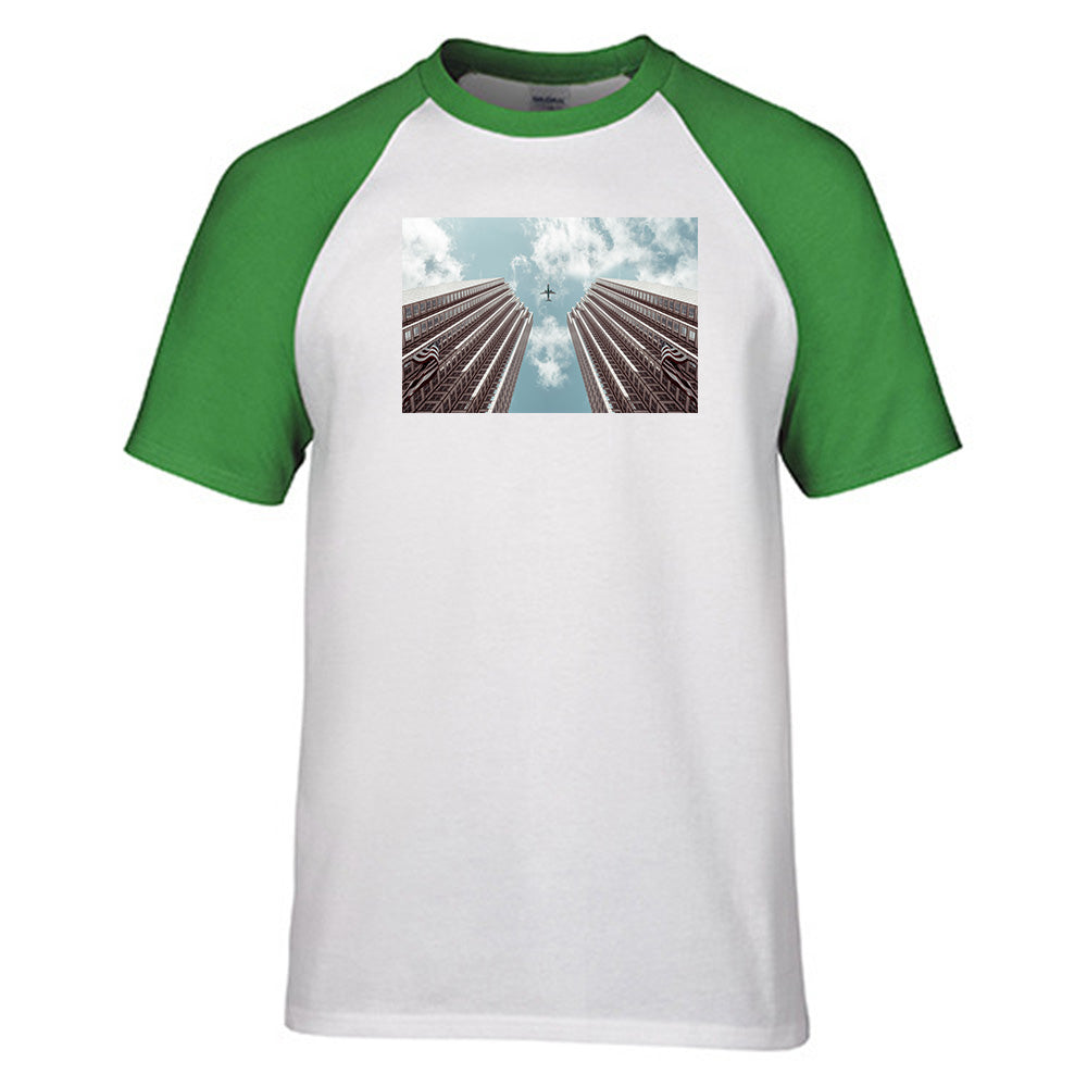 Airplane Flying over Big Buildings Designed Raglan T-Shirts