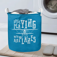 Thumbnail for Still Playing With Airplanes Designed Laundry Baskets