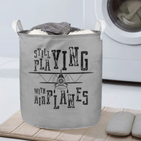 Thumbnail for Still Playing With Airplanes Designed Laundry Baskets