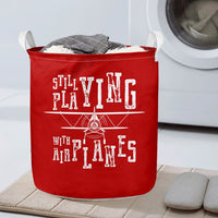 Thumbnail for Still Playing With Airplanes Designed Laundry Baskets