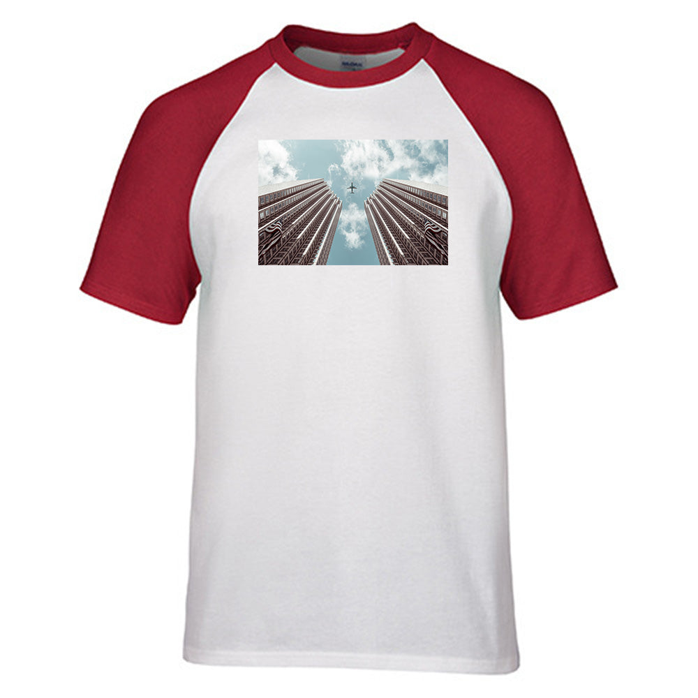 Airplane Flying over Big Buildings Designed Raglan T-Shirts