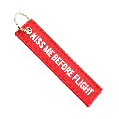 Kiss Me Before Flight aviation Remove Before Flight key chain, aviation-tag style webbing.
