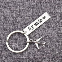 Thumbnail for Fly Safe tagged aviation themed aviator-crafted key chain, polished metal alloy.