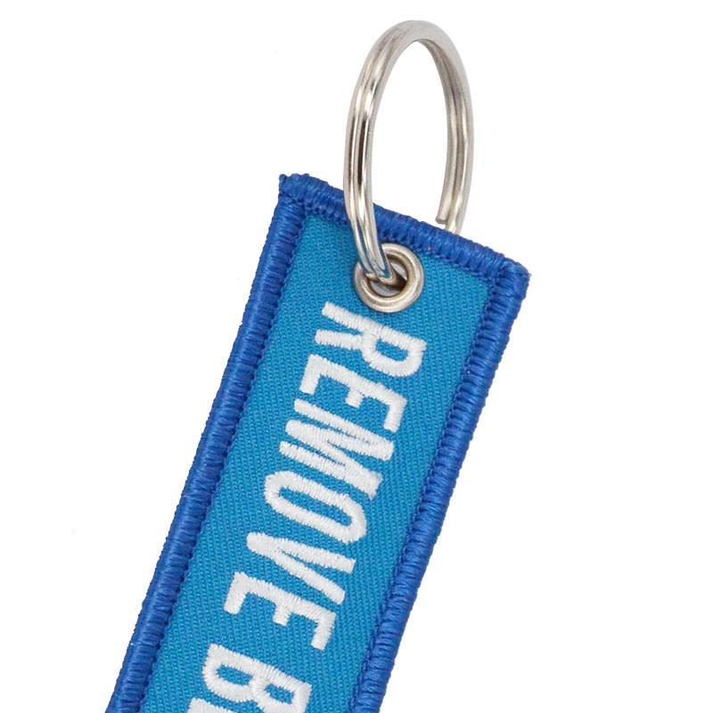 Sky Blue Remove Before Flight Designed Key Chains