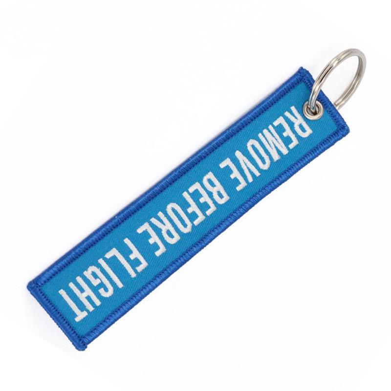 Sky Blue Remove Before Flight Designed Key Chains