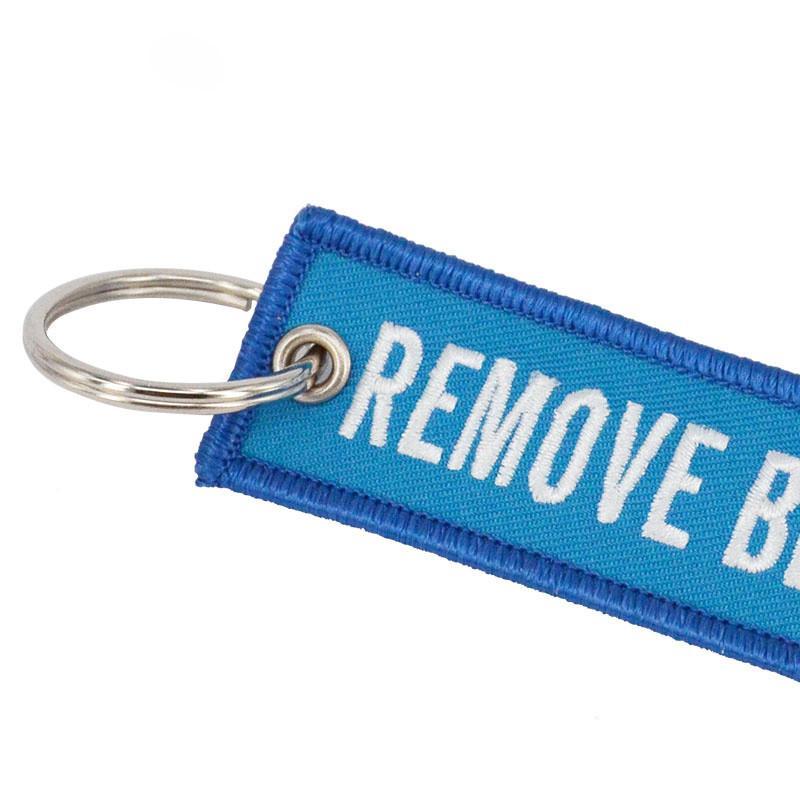 Sky Blue Remove Before Flight Designed Key Chains